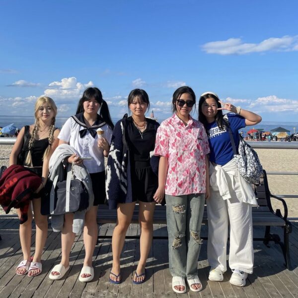 group of students visiting the beach
