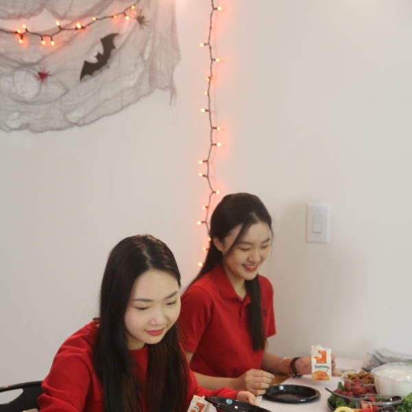 International students eating in the dorm