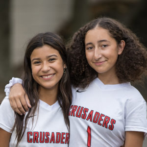 Middle School girls soccer players posing