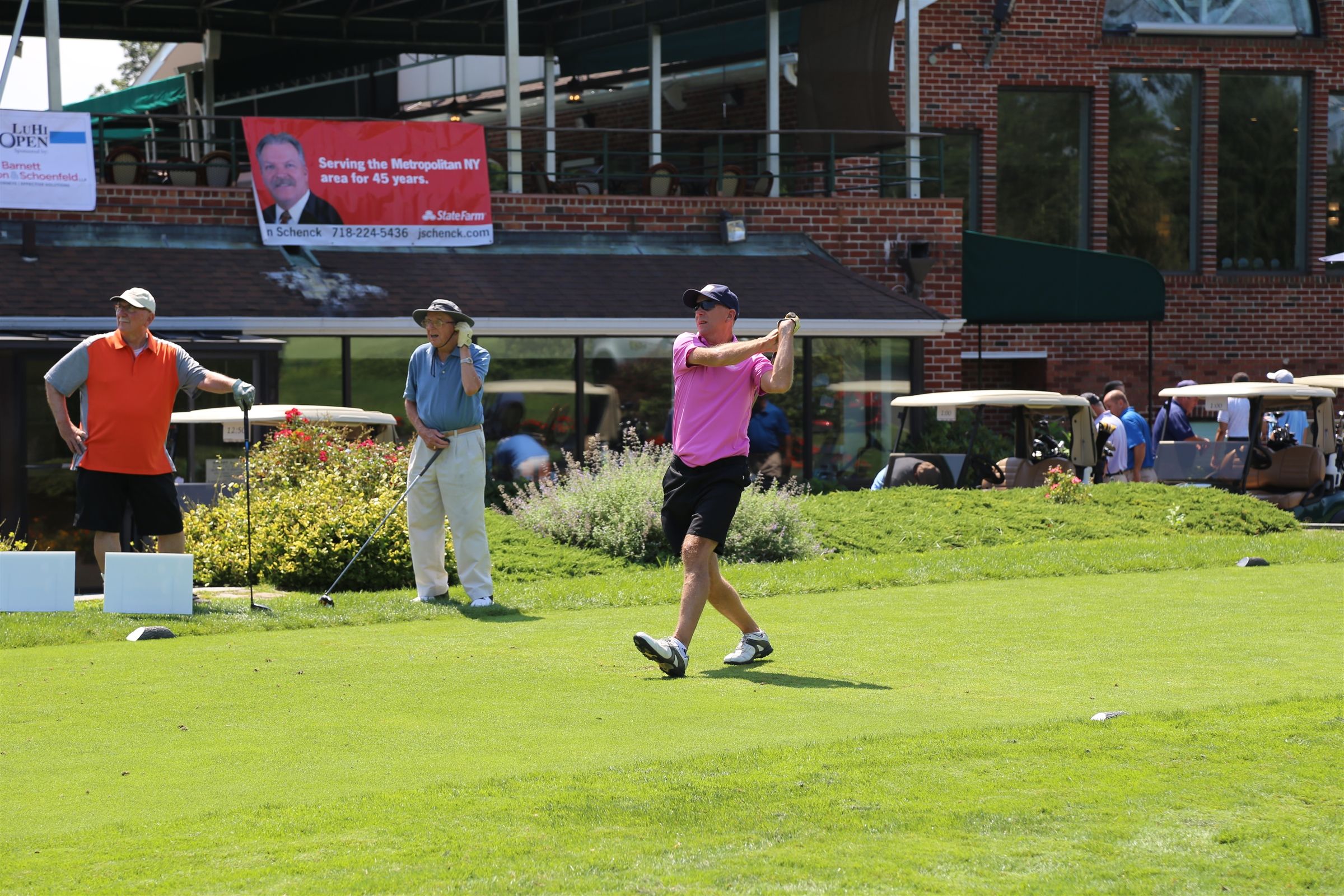 Golfer teeing off