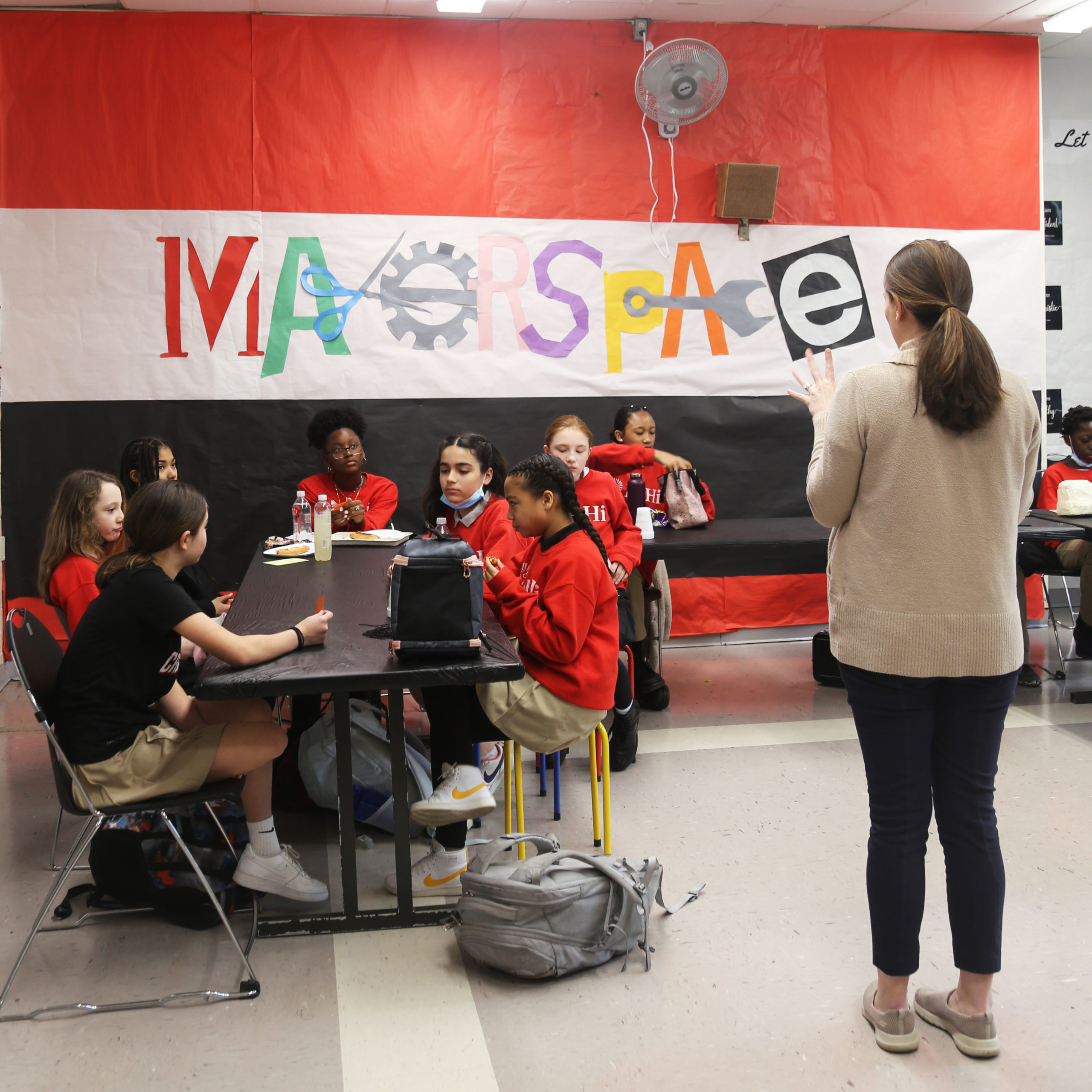 Mrs. Walters explains a task in the Middle School Makerspace