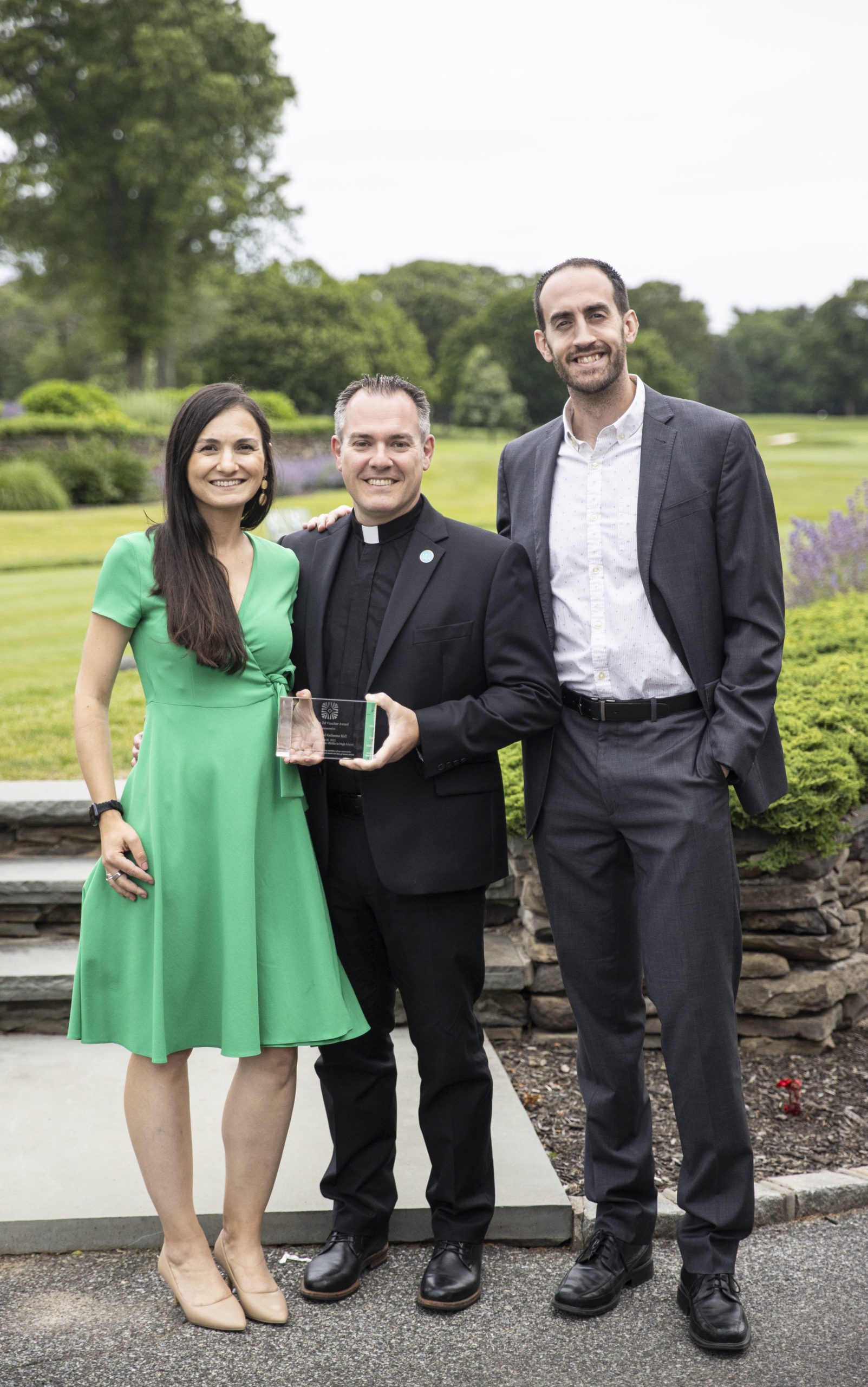 The Vetranos pictured with their award