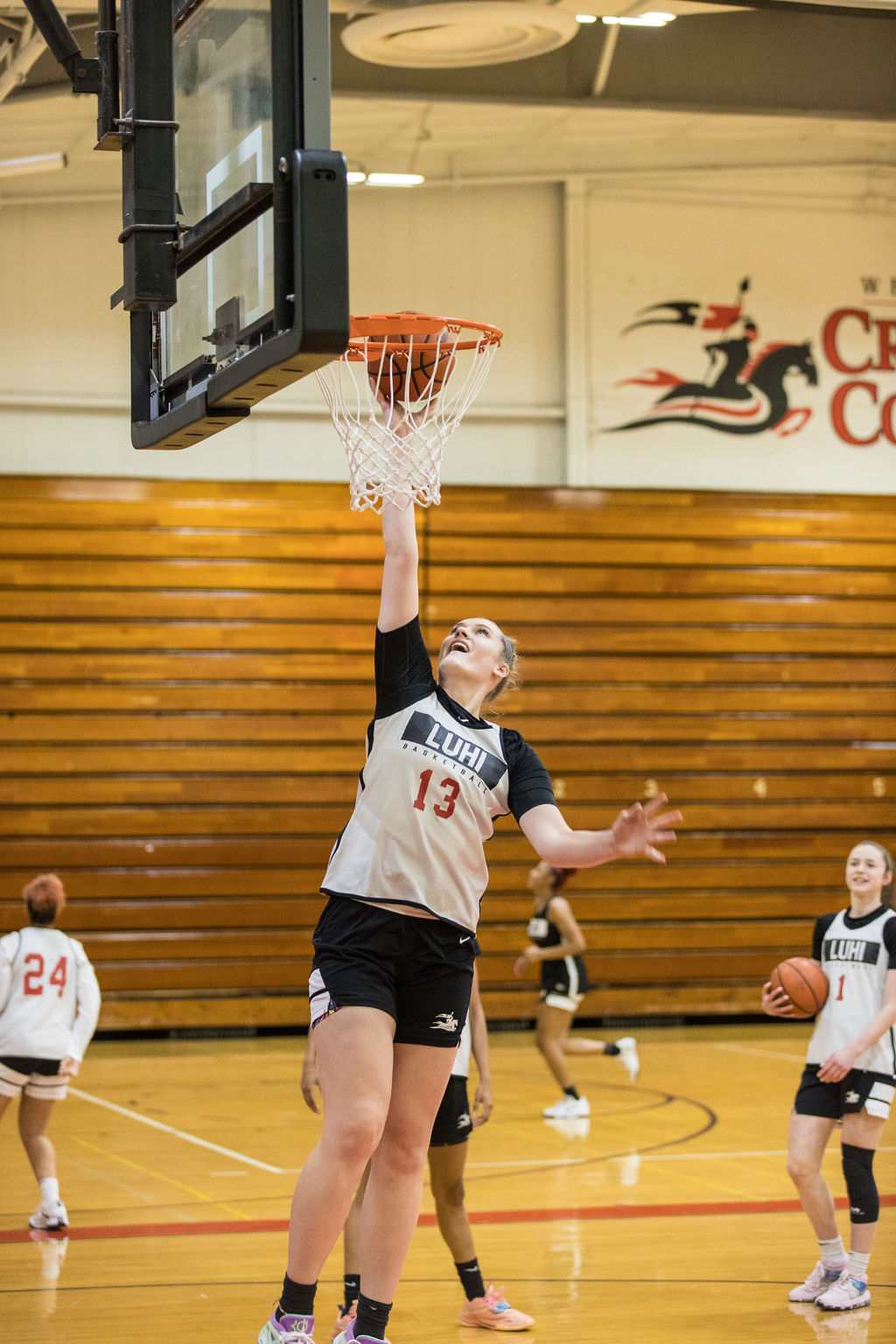 LuHi Girls Basketball player lay-up