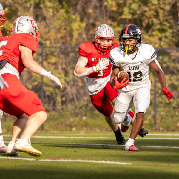 Football player running the ball