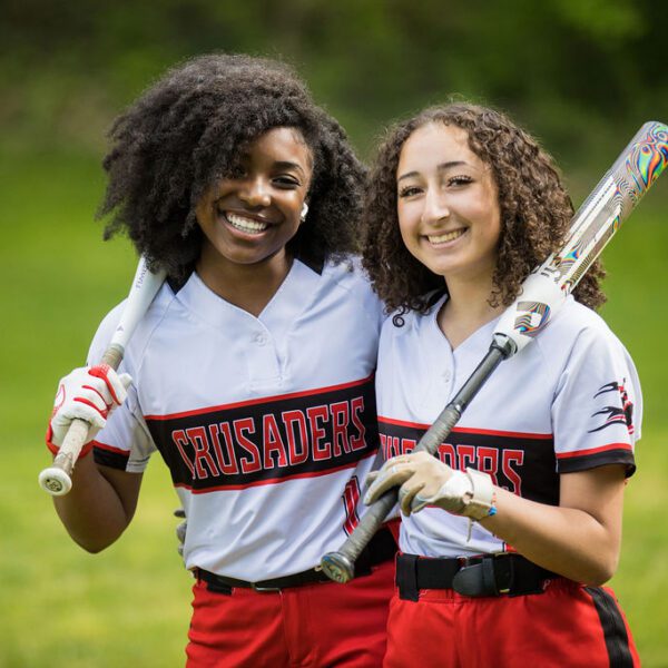 Softball players smiling