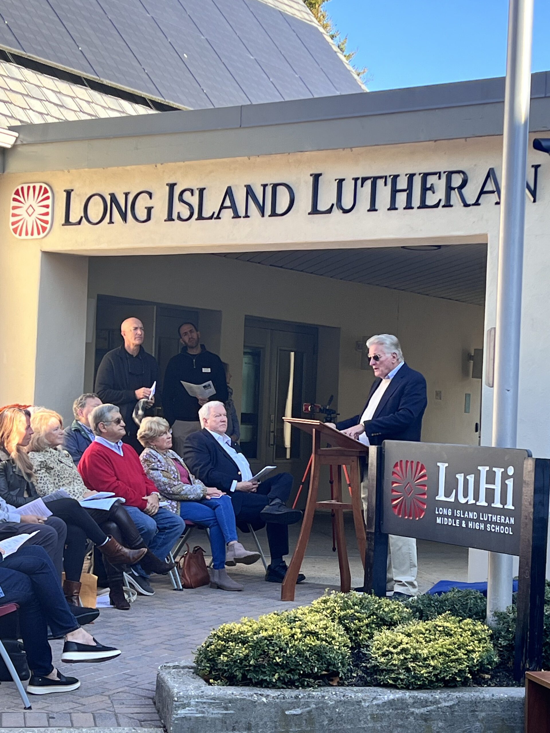 John Buck smiling for video still