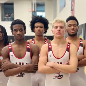 Wrestling team posing for photo at NYSAIS Wrestling Championship