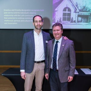 John Buck and award recipient posing for picture