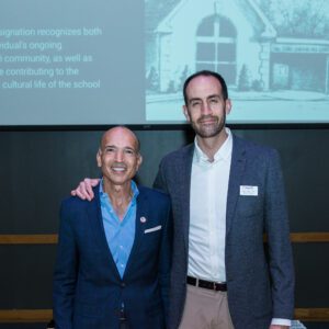 John Buck posing for picture with award recipient