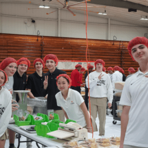 Collage of students participating in meal packing event